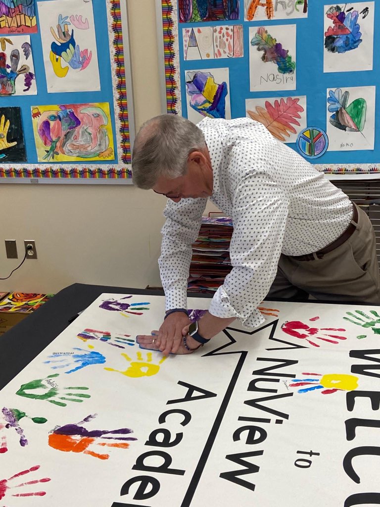 ESCofNJ's tweet photo. NuView Academy created a welcome banner 👋 as a team building exercise for the staff members, as well as a creative way to bring some needed color to the entry way! 

Each staff member painted a hand print, to show pride and care for the building and students. #ESCNJ #NuViewNJ https://t.co/nX01YddVmT