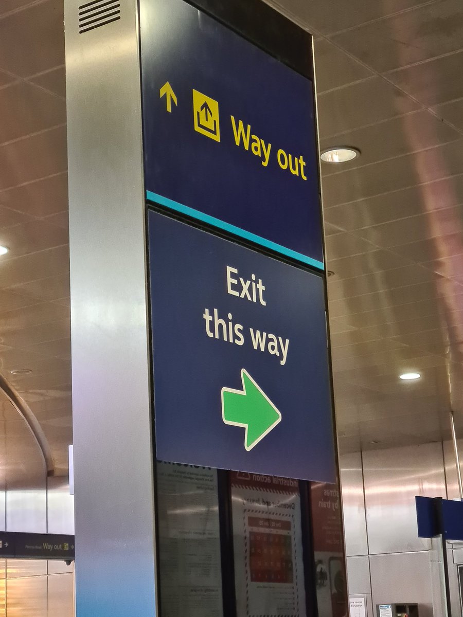 Today's conflicting sign at Kings Cross station. Do I want to Go out or to exit? Decisions decisions....