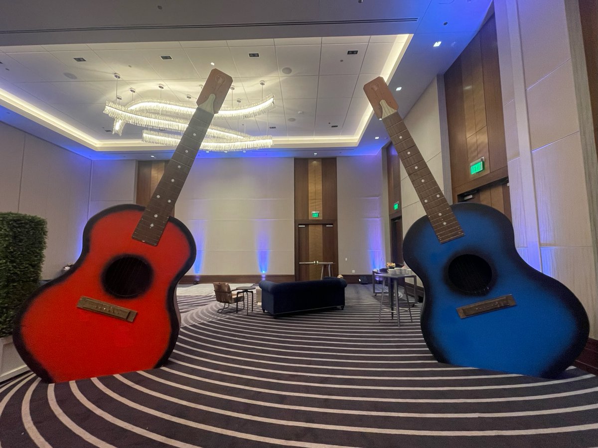 EvolvedEvent's tweet image. Nothing says "Nashville" like a giant guitar entrance! 🎸 #TeamEES