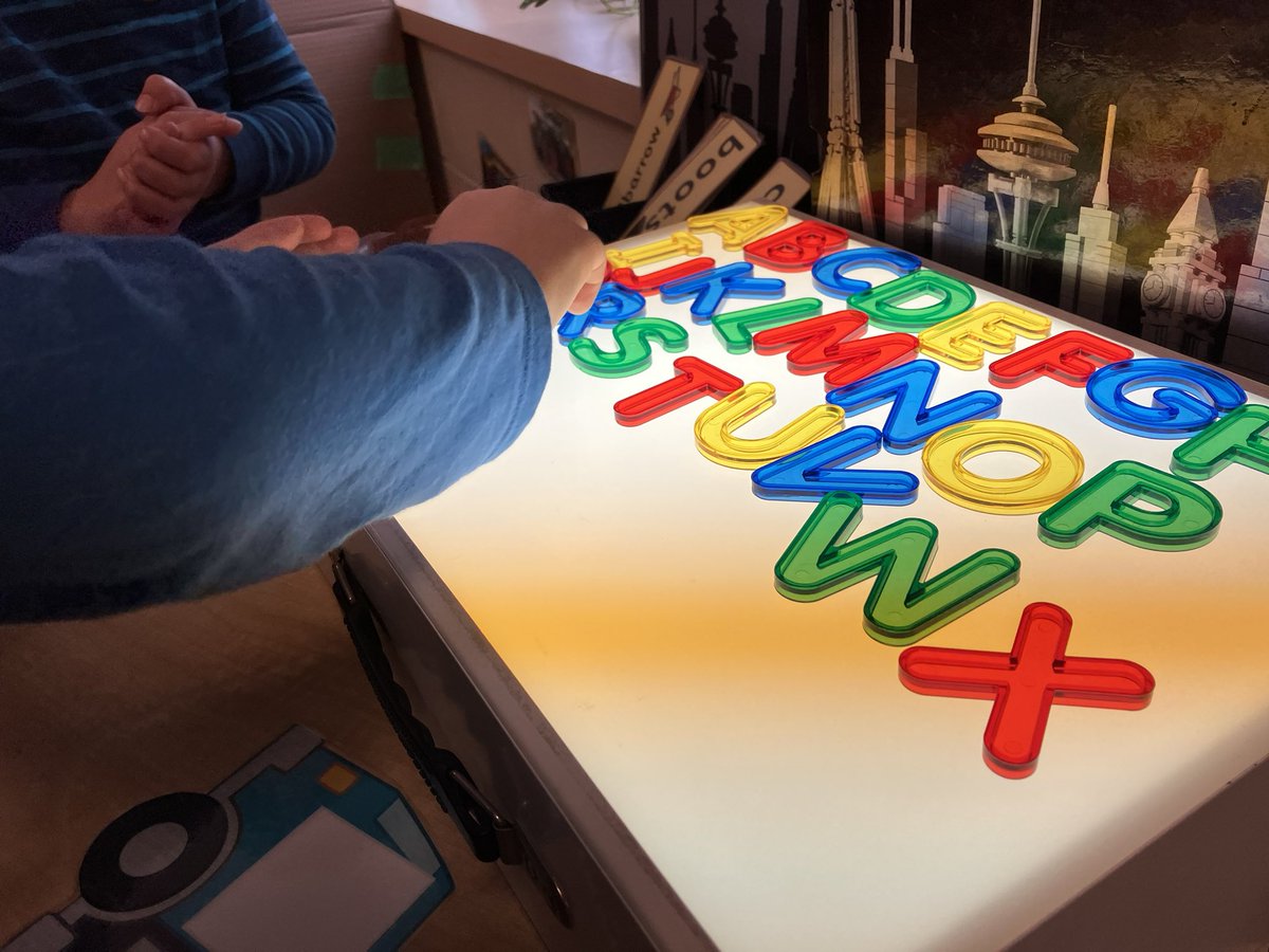 Two JK students were making the alphabet on the light table. I loved how they kept going back and singing the letters as they played to figure out what comes next. Now to explore letter-sounds &amp; words. 💕