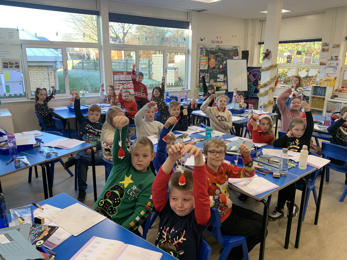A huge thanks to Janet, our ex Chair of Governors who is still active in supporting the children of our school, listening to children read every week.  On Friday she presented 250 Santa hat tree decorations that she has spent the last 12 months knitting!