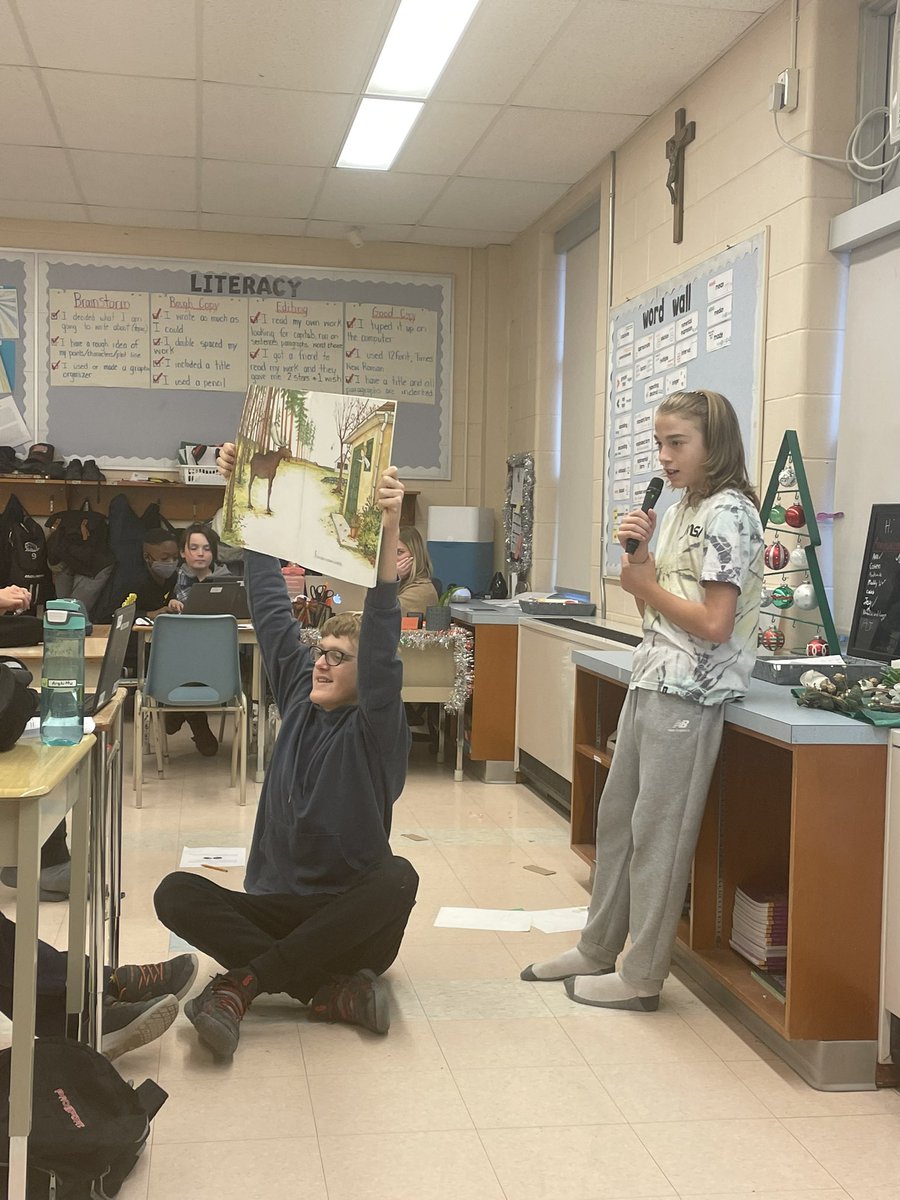 Some grade 7/8 students showing us that you are never too old for a read aloud. Having a big book just makes it better! #readaloud