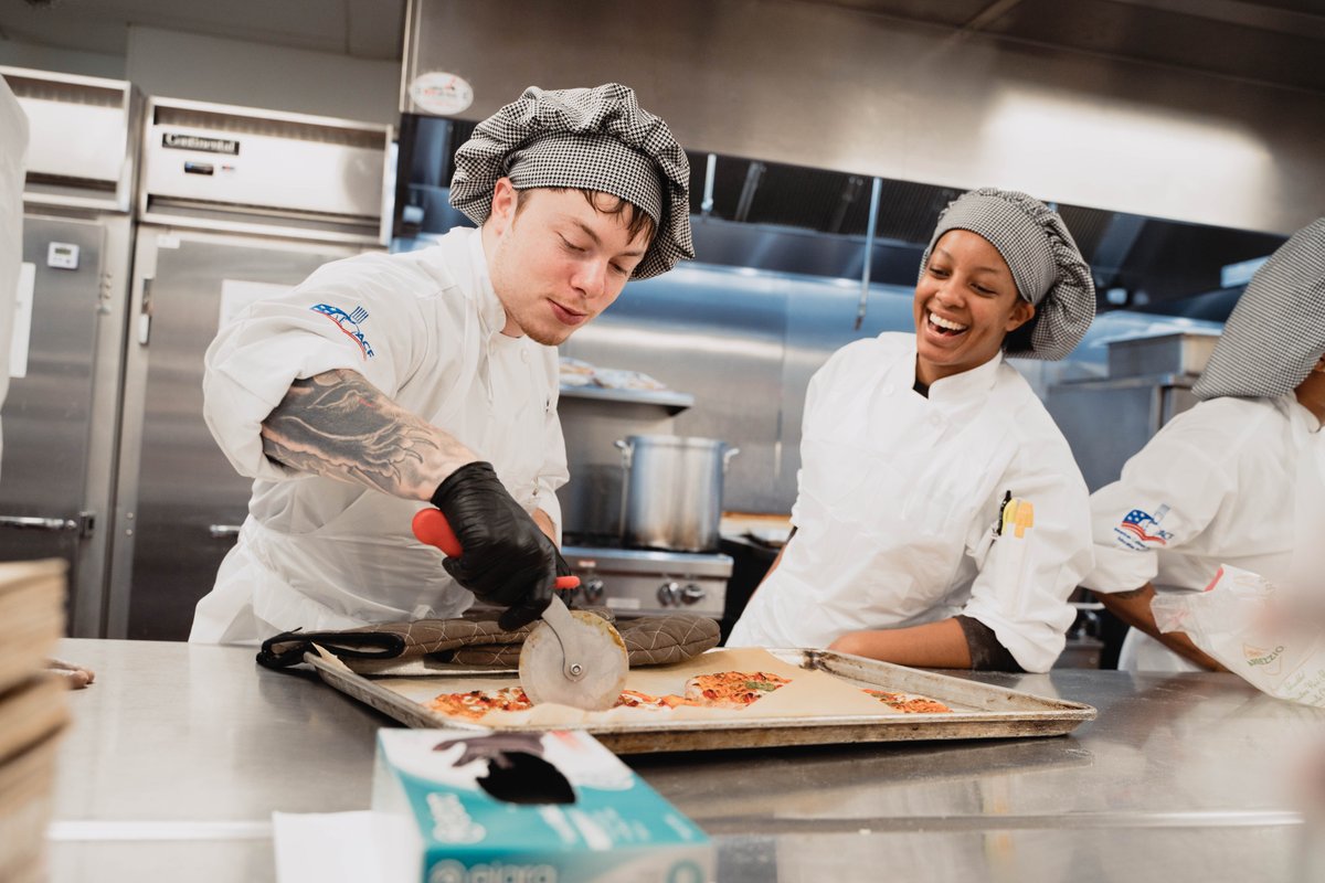 dcck's tweet photo. Thank you to our friends over at Timber Pizza for letting our Fall Cohort express some creativity while teaching them how to make their own delicious pizzas! #pizzatime #dcck #hungerfighters #culinaryjobtraining https://t.co/GyXIjwz1C5