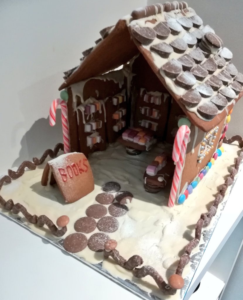 katiejlumsden's tweet image. Why, yes, I did make a gingerbread bookshop.