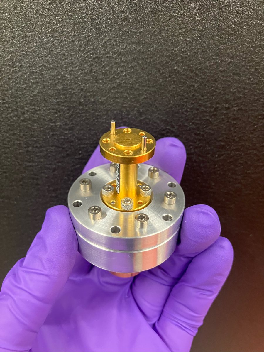 #MaterialsMonday - Machinists <a href="/Fermilab/">Fermilab</a> Machine Shop crafted these 150 GHz silver cavities (quarter for scale.) We are working with our friends <a href="/NorthwesternU/">Northwestern</a>  and studying surface processing techniques with these cavities to improve their single electron qubits. #qis