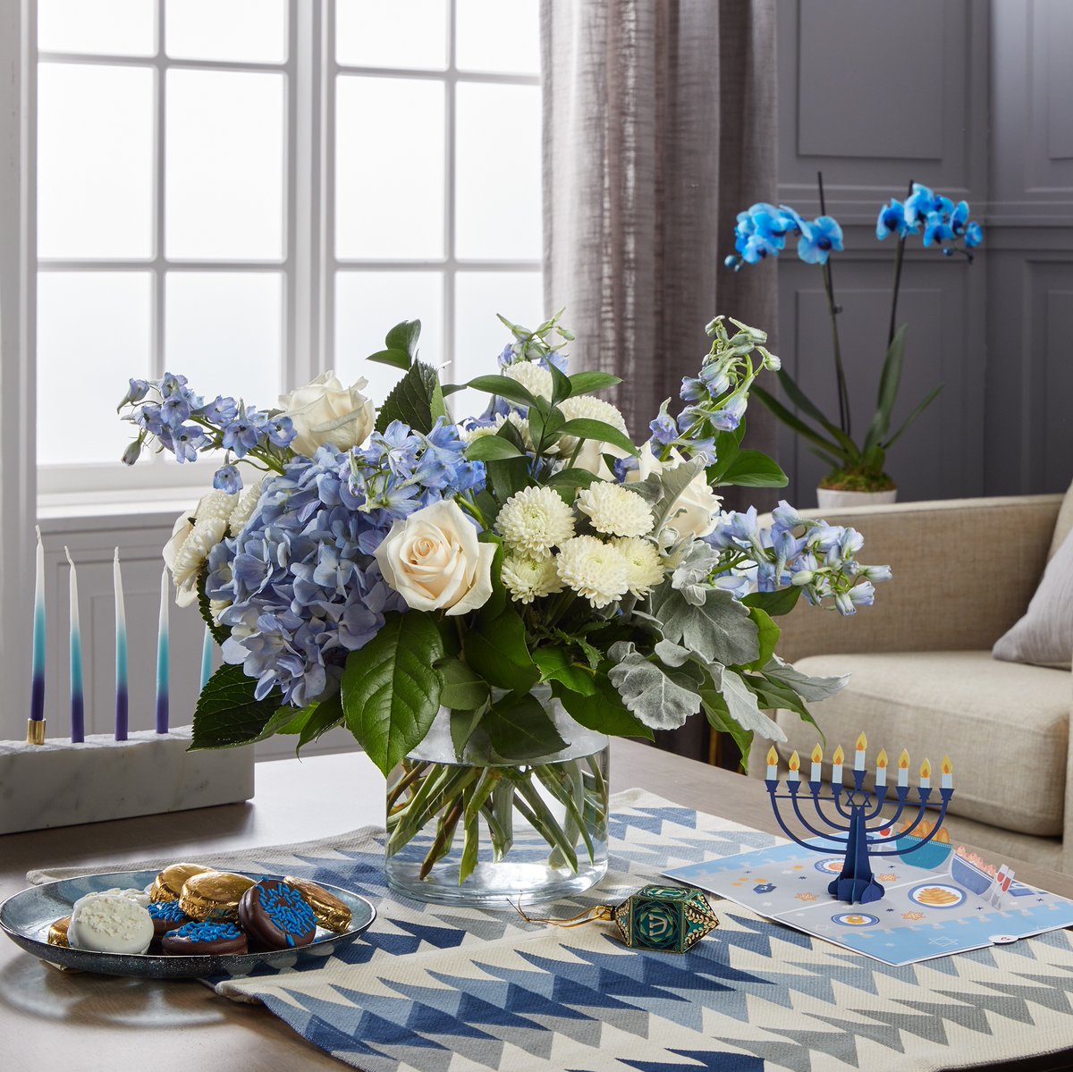 he Festival of Lights is almost here 🕎 We have the warmest florals and gifts to make your Hanukkah celebration special this season! l8r.it/mbtE