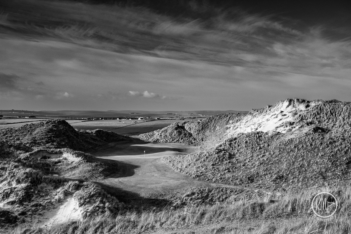 WIN a free fourball for @CarneGolfLinks 10/10 This is also my top #golf photo of the year. The par-3 14th is one of the most special holes in Ireland... but which do you prefer? To enter the draw: RETWEET for Colour LIKE for B&W Draw on the 31st