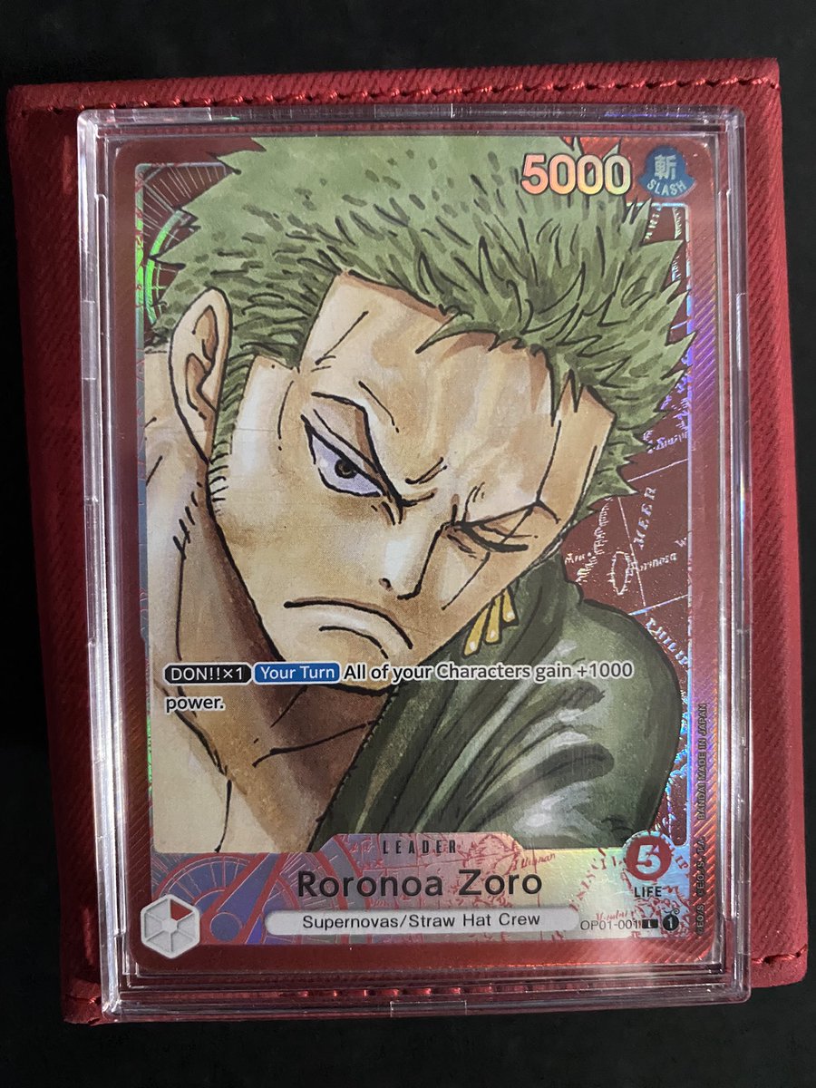 StrawhatDeku's tweet photo. Nothing like One Piece TCG with my partner on Christmas morning! Look how nice Alt Art Leader Zoro looks today! 🔥 can’t wait for the Treasure Cup in February! 🔥 https://t.co/Yi9sT8kZ4n