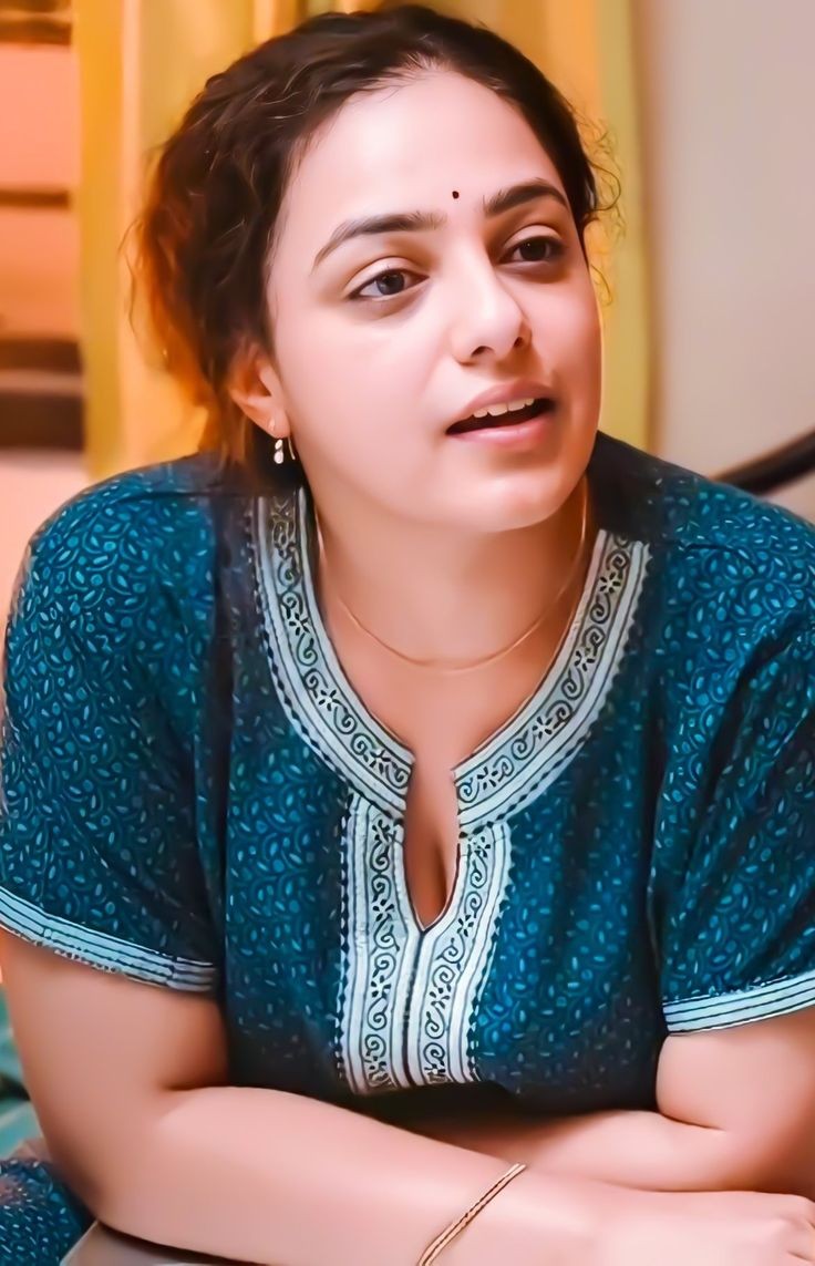 NithyaMenenFC's tweet photo. Suguna 💙 https://t.co/ofHtrxE7y9