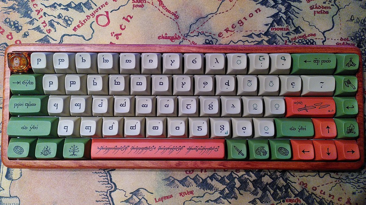 AerodzeeVGC's tweet image. I finally finished building my first custom keyboard. I'm super happy with the result. Sound profile is super thocky!
Case: bottom mount custom made wooden,
Switches: Matcha Latte V2 by @Invokeysco (lubed with 205, springs 105),
Keycaps: Tengwar keycaps by @drop x LotR.
