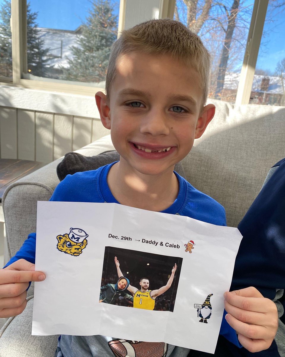 krmcox's tweet photo. The look of surprise is finding out he is going to Michigan next week to see his favorite player Hunter Dickinson @umichbball @rkmcox https://t.co/lqMWuDfo20