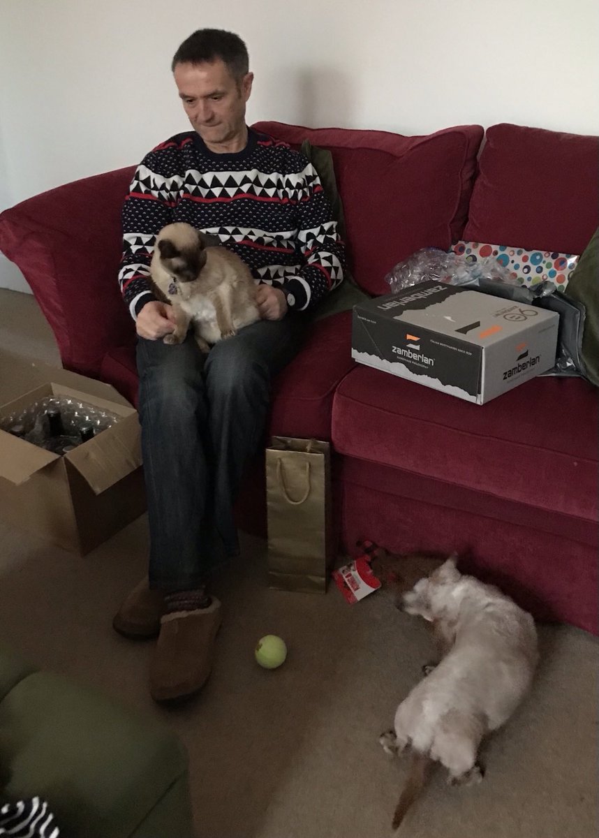 Pixiethemsd's tweet photo. Thanks for my #SecretSantaPaws as you see the cat is not so impressed π β¦@SausageArmyHQβ© https://t.co/BUyFdEm0v9