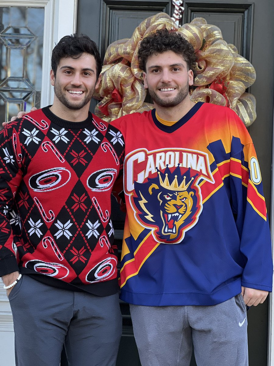 ChrisT_20's tweet photo. The big bro came through huge this Christmas with a @KevinWeekes Carolina Monarchs Jersey! Can’t wait to rep my favorite Cane of all time in PNC! https://t.co/VFncT4hHHf