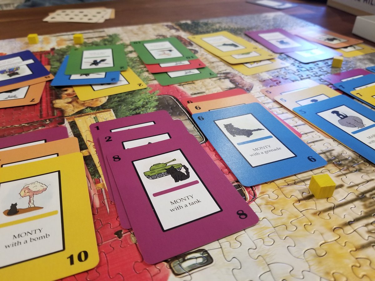 WTaffles's tweet image. My wife and I's favorite game is @ReinerKnizia Battleline. My wife made me a custom Battleline game themed with our dog and cat for Christmas!