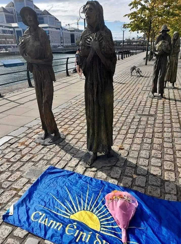 Gaunt, spindly figures making their way towards Dublin port.  Their faces are a picture of horror and loss. Are they carrying living children on their backs or clinging to tiny corpses? 
    #GenocideNotaFamine
This memorial to the Irish holocaust  in Dublin