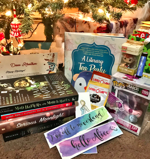 frozenbookblog's tweet photo. Thank you so much @elleyotter for all the #tbtbsanta gifts! I opened the last one today and I'm SO excited about the cookbook, the bookstore book, hot chocolate and bookmarks!! The lip balm smells so good too! But I forgot to include the ornament cuz it's already on the tree. ;) https://t.co/djx93BL7mB