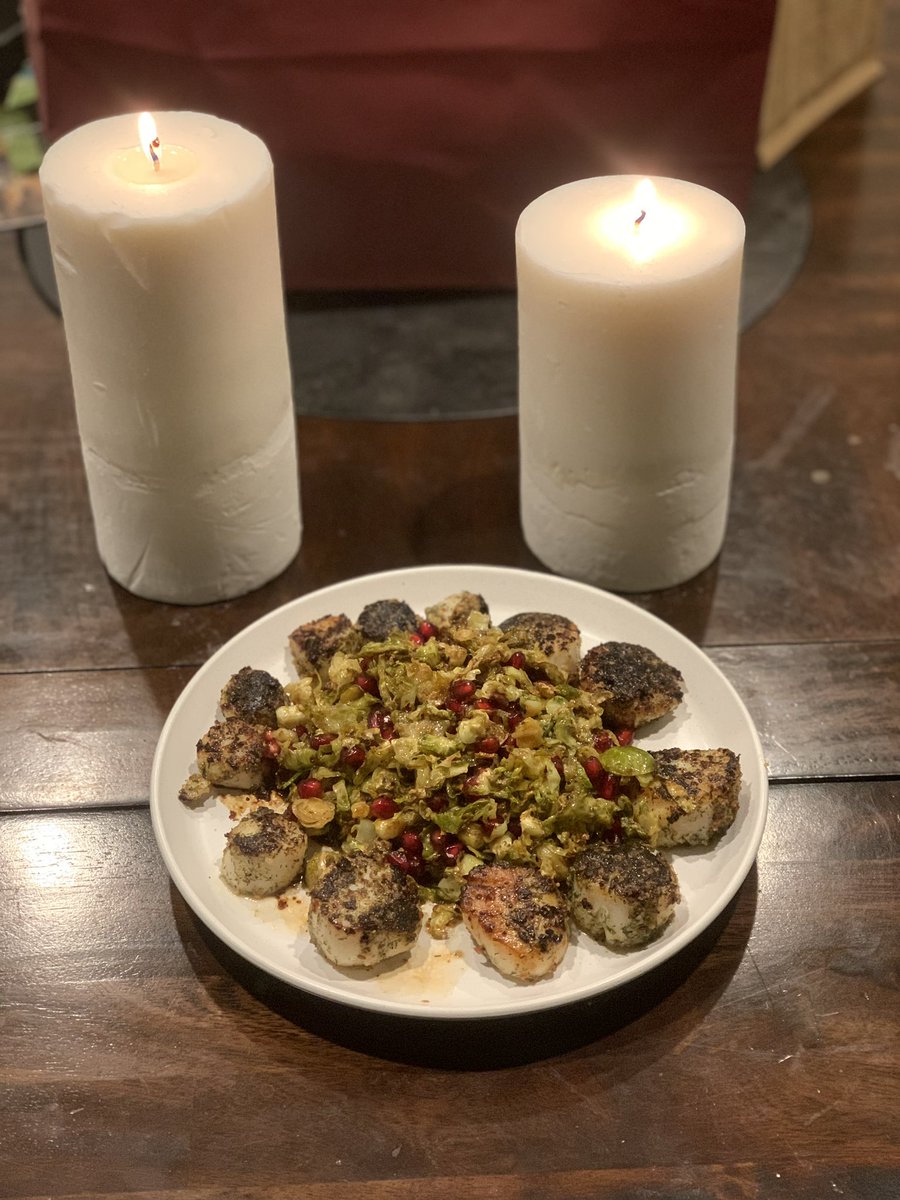 Scallops, Brussel sprouts with pomegranate vinaigrette.