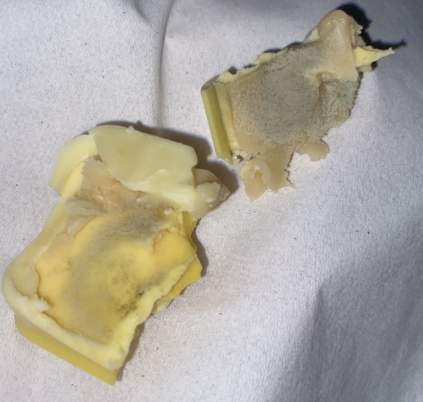 aileenmorrison's tweet photo. @HotelChocolat this is a lemon meringue chocolate. Is this mould inside? My other one didn’t look like this. Did I just bite into a mouldy chocolate? https://t.co/OsIXlekOnB