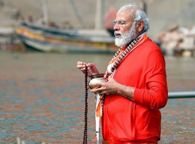MadhavSharma's tweet photo. Congress’s Darbaris are hailing Rahul Gandhi for walking in a t-shirt on a cold winter morning.

These losers need to be reminded that PM Shri @narendramodi, at the age of 71, took dips in Maa Ganga &amp; spent 5 minutes inside the ice-cold water, in the month of December last year. https://t.co/jhruvJj84e