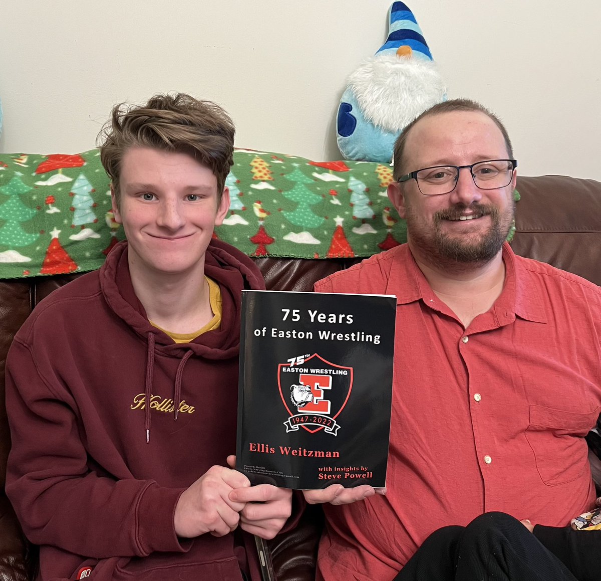 BoysEaston's tweet image. Don’t forget there’s still time to enter our giveaway for a copy of our new book! Here’s our cover artist and statistician with a Christmas copy.

Enter by January 1st. Retweet the tweet below.
