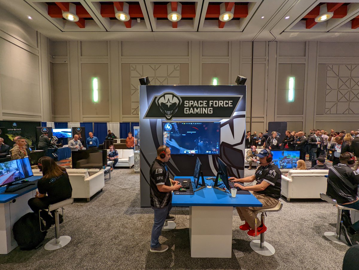 AirForceGaming's tweet photo. With 2023 around the corner, we wanted to look back at our 2022 highlights, starting off with the @TeamLOA Symposium in Salt Lake City last March!  

We hosted a gaming booth during the convention to present our program to industry and senior military leaders. 

#AFG2022Recap https://t.co/r42UvM5jJz