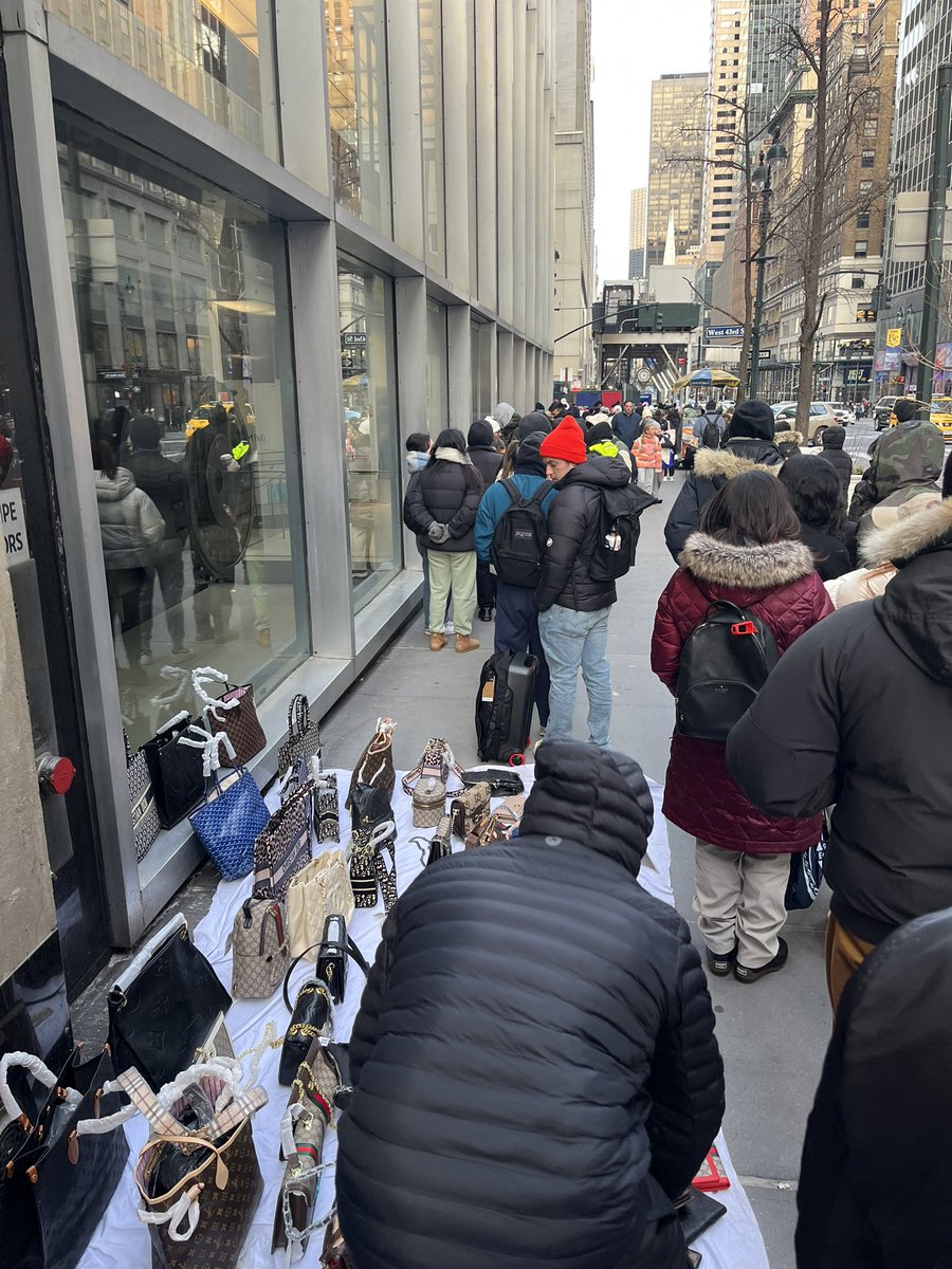 I’m in the longest line to get into the <a href="/thenorthface/">The North Face</a> store on 5th ave. It’s 21 degrees outside and they’re moving super slow. smh