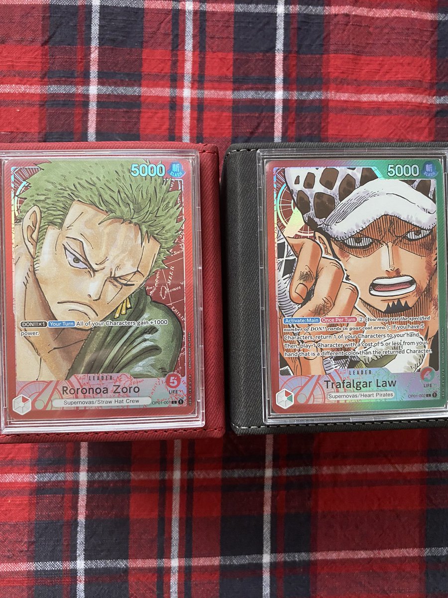 StrawhatDeku's tweet photo. My partner and I’s Alt Art Leaders are ready to go 💪🏼 Zoro and Law looking ready for war 🔥 🏴‍☠️ #ONEPIECE #OnePieceTCG #OnePieceCardGame https://t.co/bSUAB7DFnS