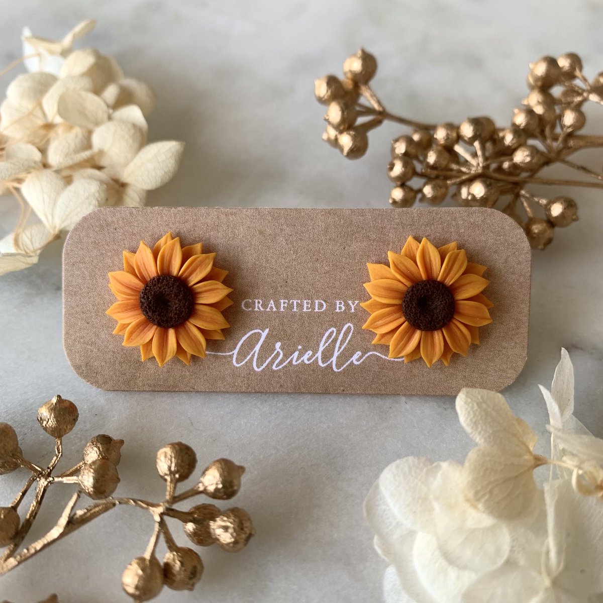 craftedbyari's tweet photo. sunflower necklaces, studs, and hoops will be available tonight at 8pm EST as part of my final drop of the year ☺️🌻✨ https://t.co/usYWqLX0QL