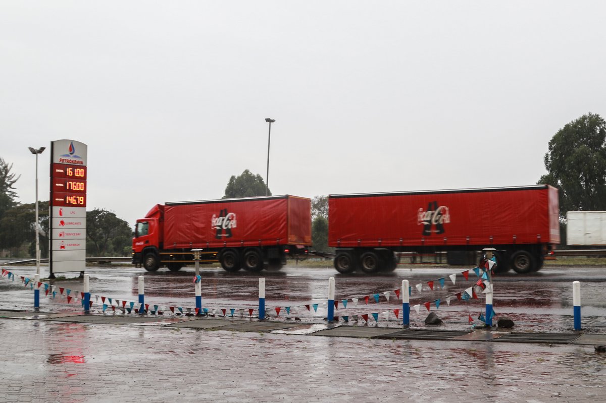 wethankmedia's tweet photo. Vehicles are driven past a fuel price board on a busy highway in Nakuru Town. In January 2023, fuel price is expected to increase after the scrapping of a fuel subsidy scheme. https://t.co/6i6VXtQIPB