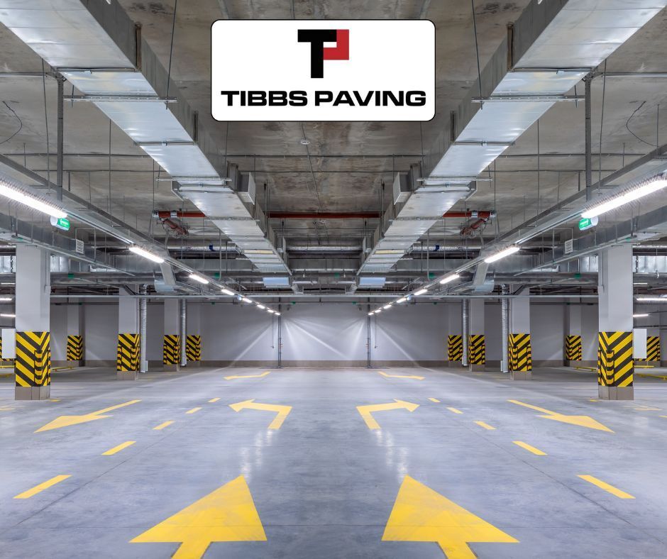 Did you know? We can stripe indoor parking garages at ANY time of year. Contact us to schedule a site visit. bit.ly/3MLW3vd #TibbsPaving #PavementStriping #CommercialPavers