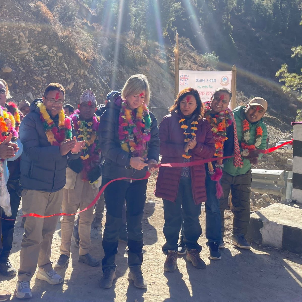 NicolaPollittUK's tweet photo. Excited to be up on the Mugu/ Humla border, handing over the Mugu Humla link road to the government of Nepal 🇳🇵. The link road has more than halved transport and food prices for local people. On behalf of 🇬🇧 I wish the people using this road the very best. #UKaid https://t.co/VtOtPmgd1k