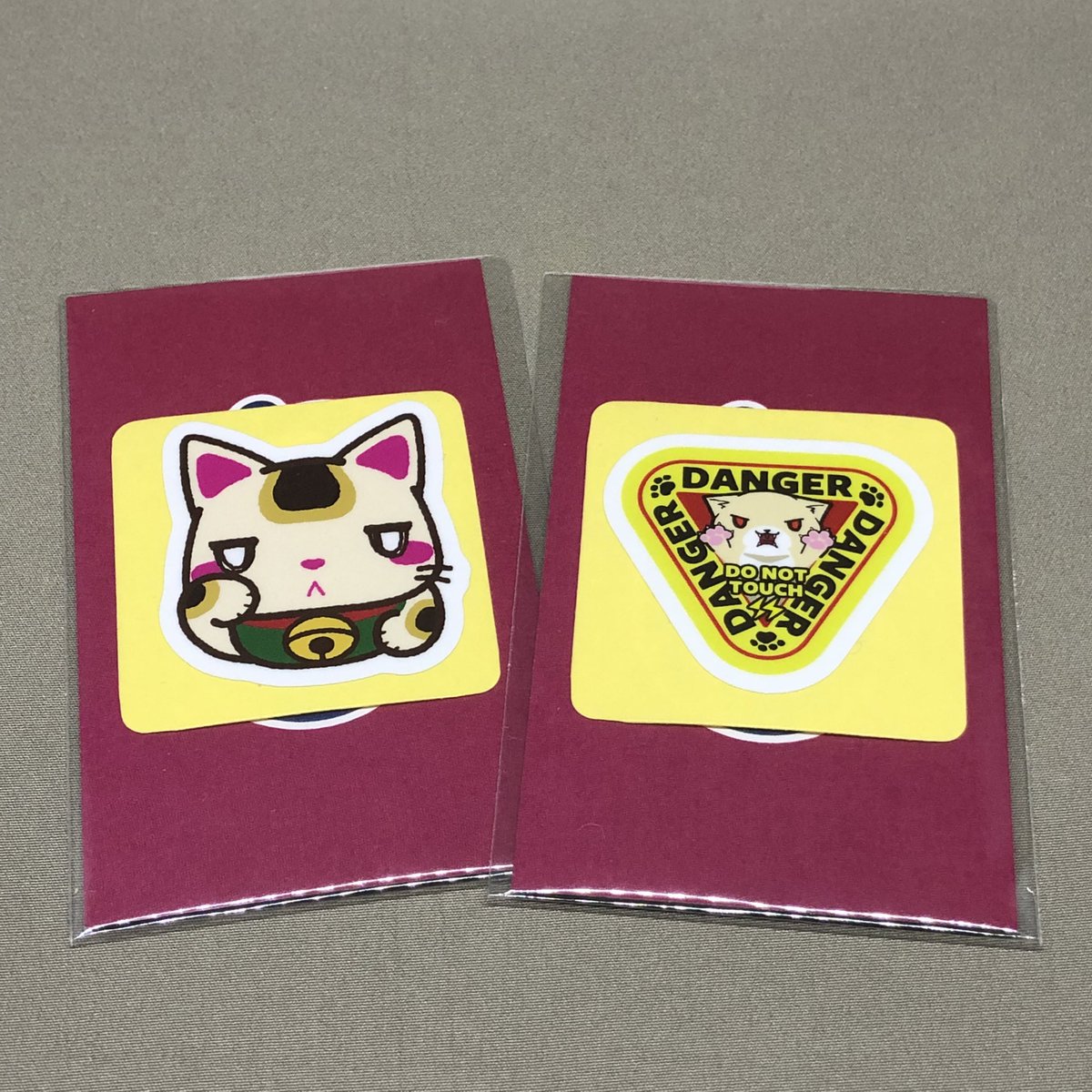 necco_ya's tweet photo. 工場からさっき届いたできたてホヤホヤの新作！
招き猫ミニステッカーとデンジャーミニステッカーです。
BASEにて好評販売中です。
https://t.co/G0CdUZ2wLi

12月18日「キャットラバーズマーケット」in川口リリアでもご覧いただけます。 https://t.co/A1dXlDo380