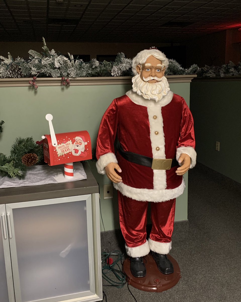 vickibowe's tweet photo. Making toast over in the admin kitchen while my pal Nicklaus supervises. #creepySanta #YesHeSings https://t.co/mA0BSgAvr4