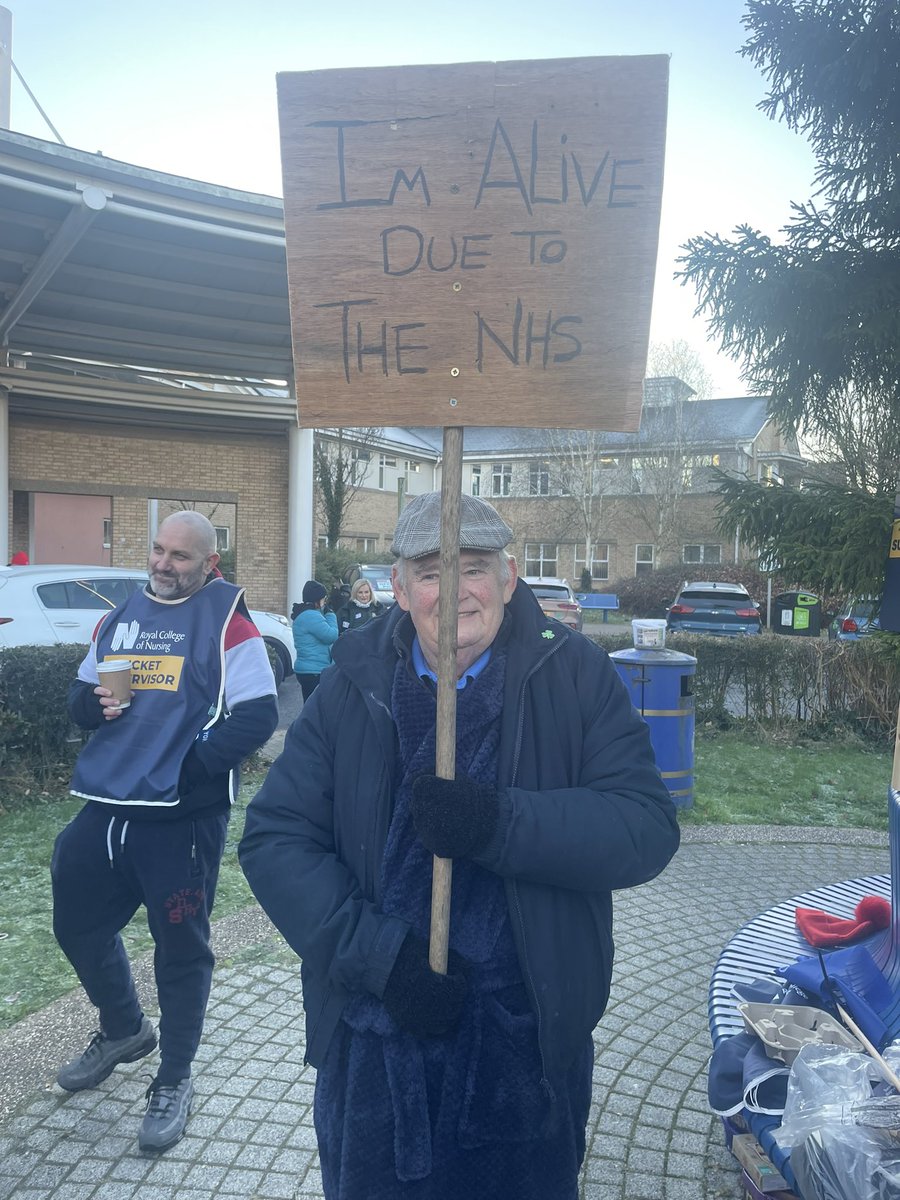This is Tom outside our hospital today ….. brought  tears to my eyes #FairPayforNursing
