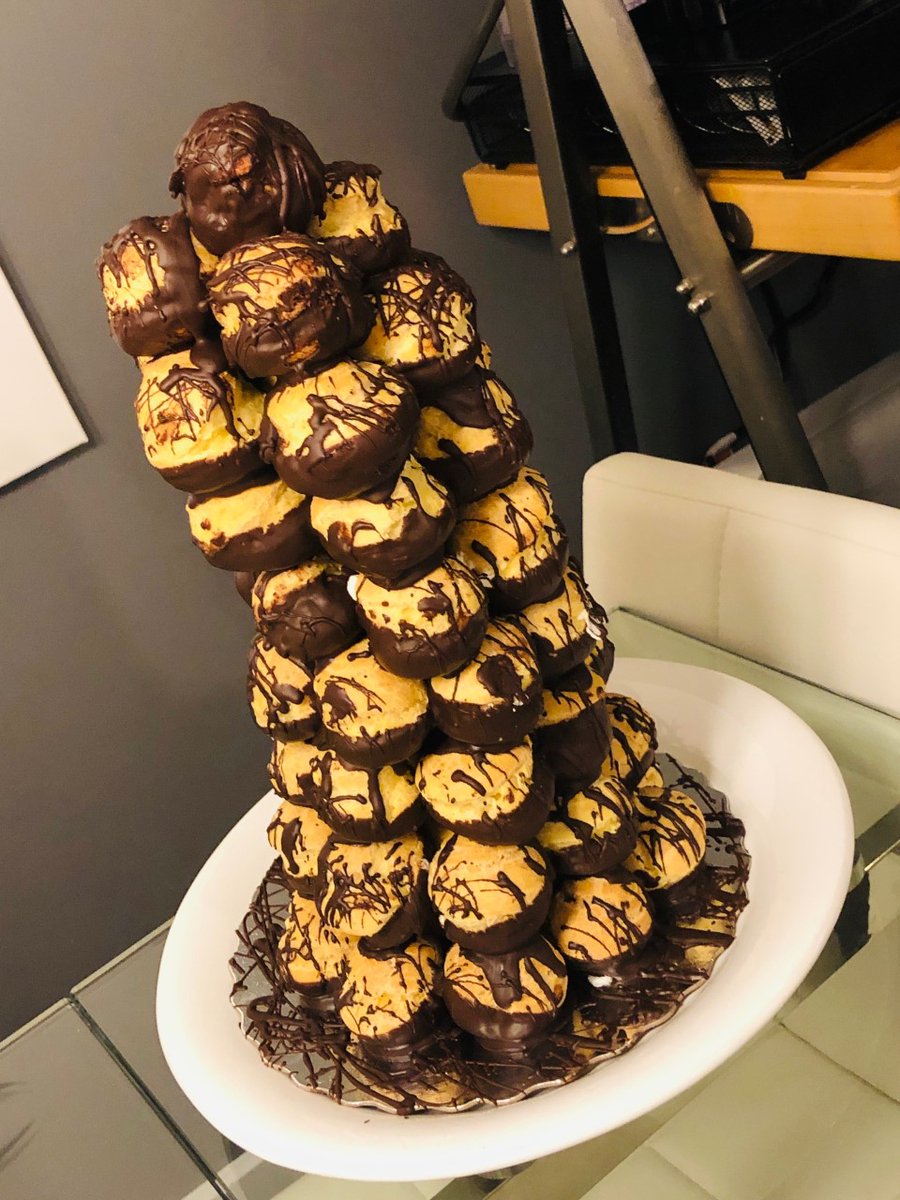 Differly's tweet image. Our dessert at the #Differly Christmas party last week - tower of chocolate power.  Bets on how long it stayed like this?  😆