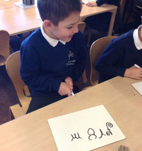 MissScrubyNHP's tweet image. Year 2 had a go at some calligraphy linked to our RE and Art. They were really proud of their writing!