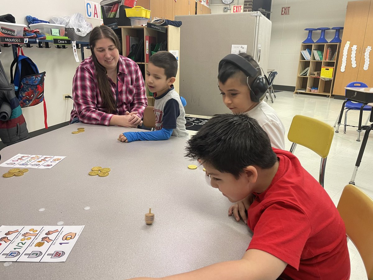 Learning how to play Dreidel in Ms. Coursey’s room.