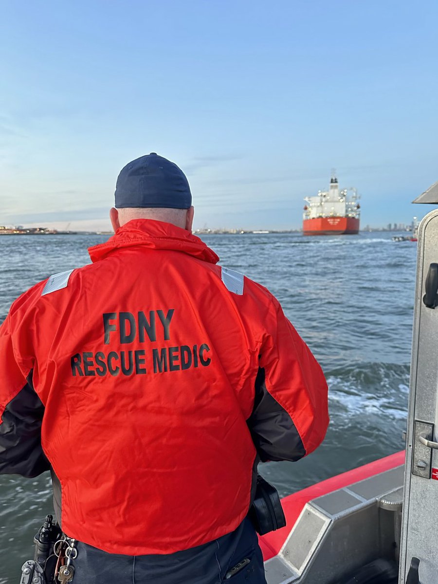 FDNY's tweet photo. Yesterday, #FDNY Rescue Paramedics, Marine Company 9, and the Marine Battalion escorted and evaluated two individuals who were lost at sea for days. The coordination between the @USCGLANTAREA Command and the FDNY ensured safe transfer of these two individuals back to shore. https://t.co/HNgIIhzHG1