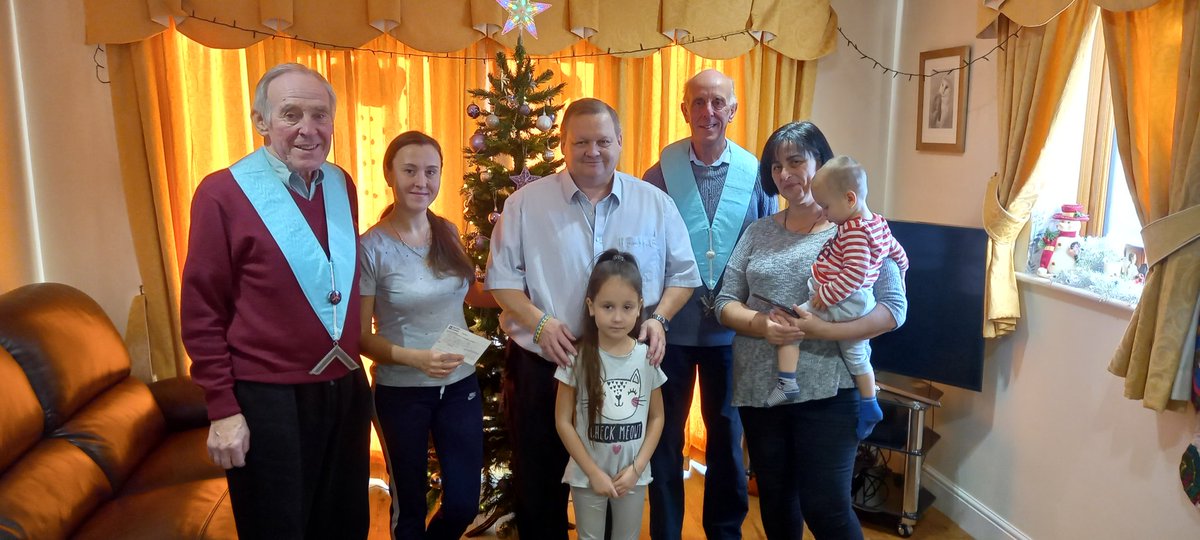 MartynBertalan's tweet photo. Christmas arrives for a Ukrainian Family supported by Mentor Lodge No7064 Worshipful Master John Twells, Secretary John Cole and Charity Steward Martyn Bertalan present a cheque for ��250 to Karyna (mum), Polina (Grandmother). #freemasonry  #freemason #masons
 #masonic #Ukraine https://t.co/CMswGIlR6S