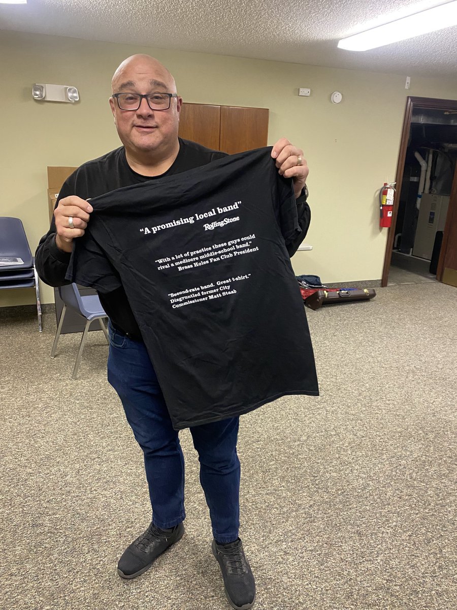 BrassHolesSF's tweet photo. Season's greetings from the Brass Holes!🎄

Back by popular demand, we have re-stocked our official merch. Same design with a few additional quotes from loyal fans and "publications" on the back. 

$20.

The first shirt from the new batch goes to Elexa who claimed hers in August! https://t.co/h4jSlbYfEX