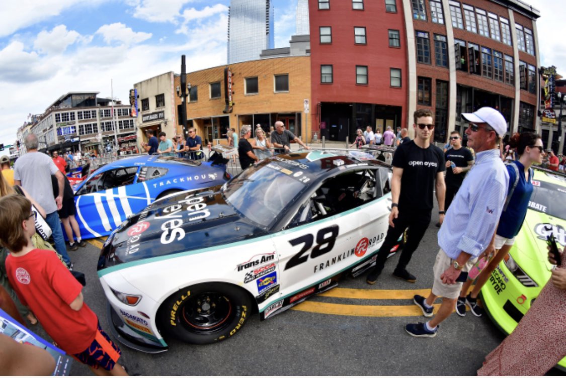TeamSLRinsider's tweet photo. #ThrowBackThursday to this years @MusicCityGP where the No 28. Open Eyes/Nacarato Trucks/Franklin Road/ TeamSLR Ford Mustang piloted by @connormosack was chosen as one of the 6 TA2 cars to be showcased at the fan walk event!

Photography by @ChrisGreenPics 

#TeamSLR #M1 #TransAM https://t.co/NowWuZz5uW