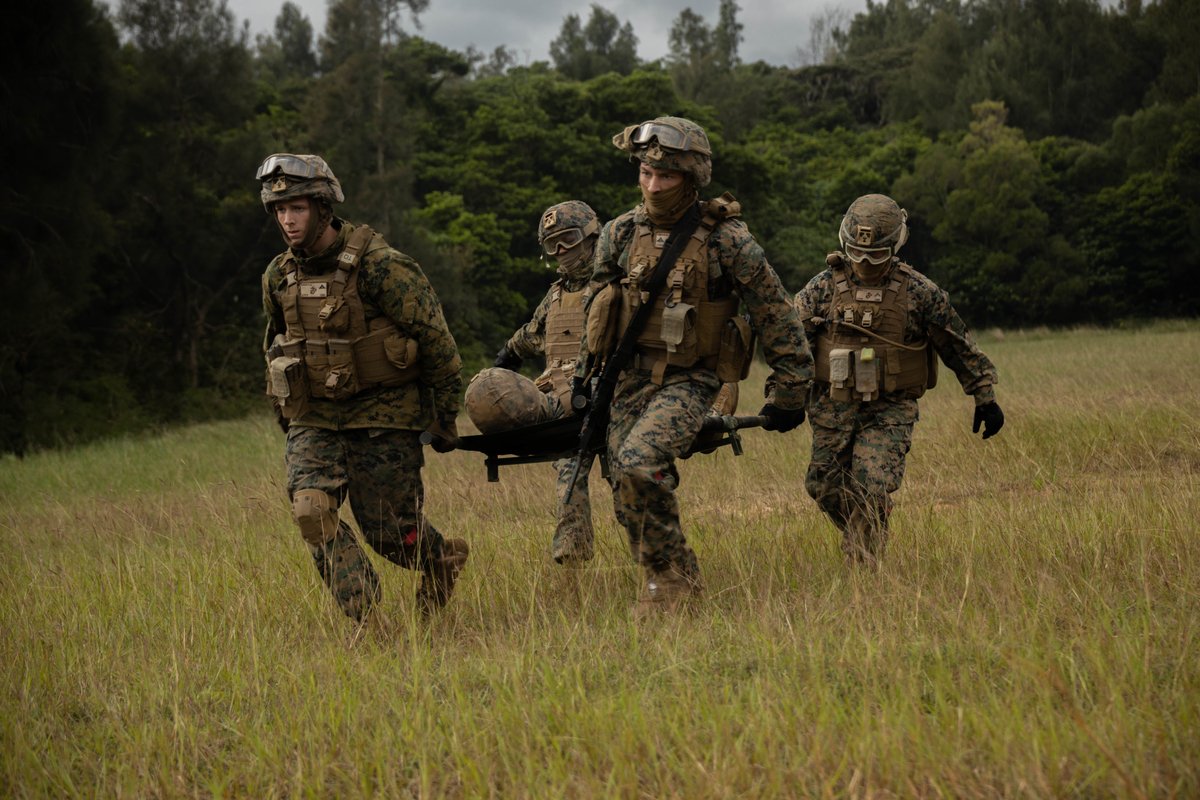 USMC's tweet photo. #Marines with @3rdMLG perform a simulated casualty medical evacuation with Marines from @3rdmaw during Exercise Winter Workhorse on Camp Hansen, Okinawa, Japan, Dec. 6.

#WinterWorkhorse is an exercise focusing on mission-essential tasks in forward-deployed, austere environments. https://t.co/2LrNgE7vnN