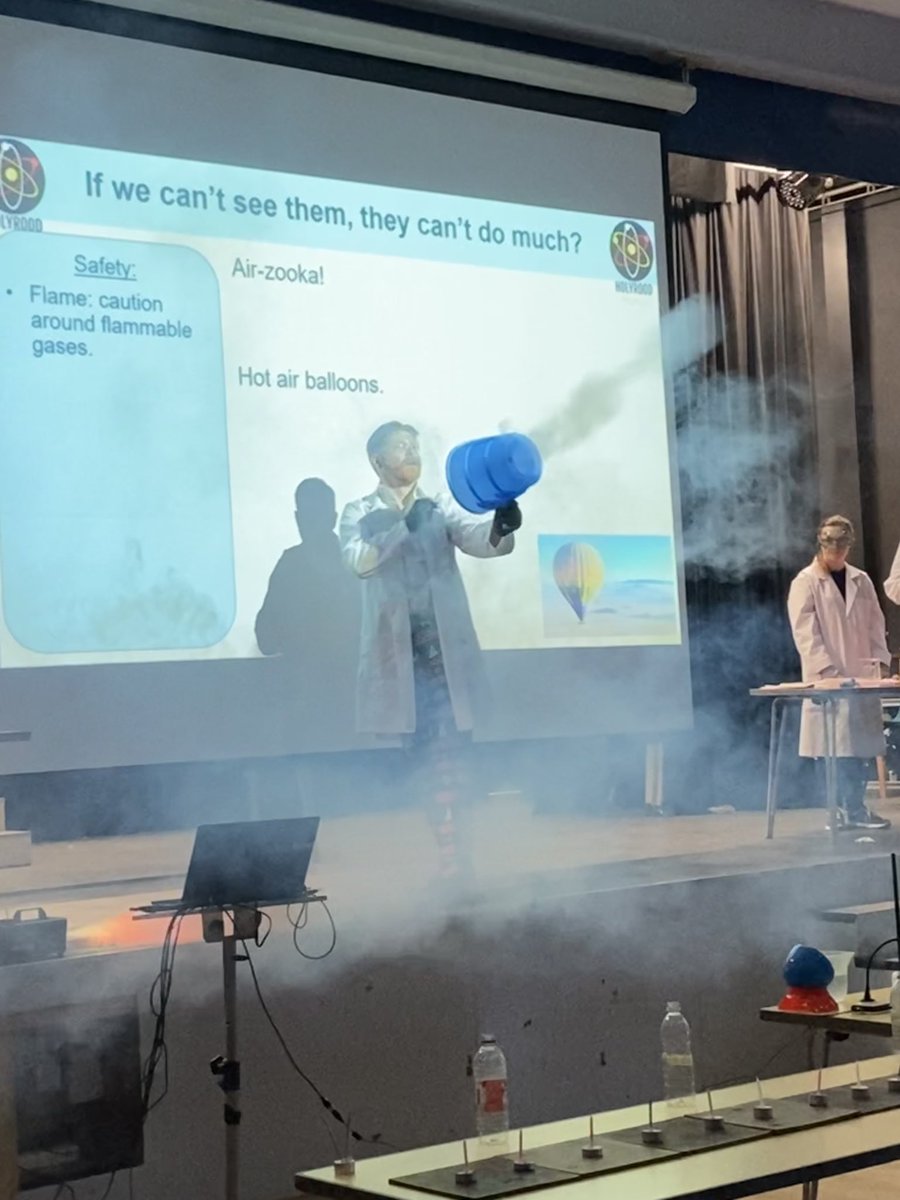 HolyroodAcademy's tweet photo. Year 7 were treated to Holyrood’s own version of a Royal Society of Chemistry Christmas Lecture today! Our very own Greatest Showman - Mr Pearce - captivated the students with dry ice, explosions, air-zookas, big bangs (and his Christmas suit)🎄🎅🏻 https://t.co/bQcGzJD9lN
