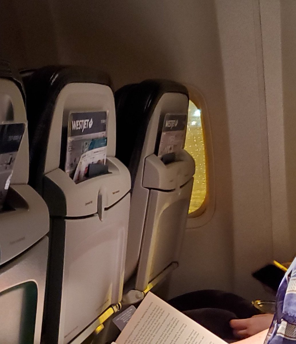 PeanutGalleryTO's tweet photo. @WestJet over an hour sitting on the tarmac after being told we were waiting for a forgotten log book,  now it's de-icing. Going to miss my connecting flight and have to spend the night in Calgary airport. First time taking Westjet in 10 years, disappointed at the lack of comms. https://t.co/WsafTe6155