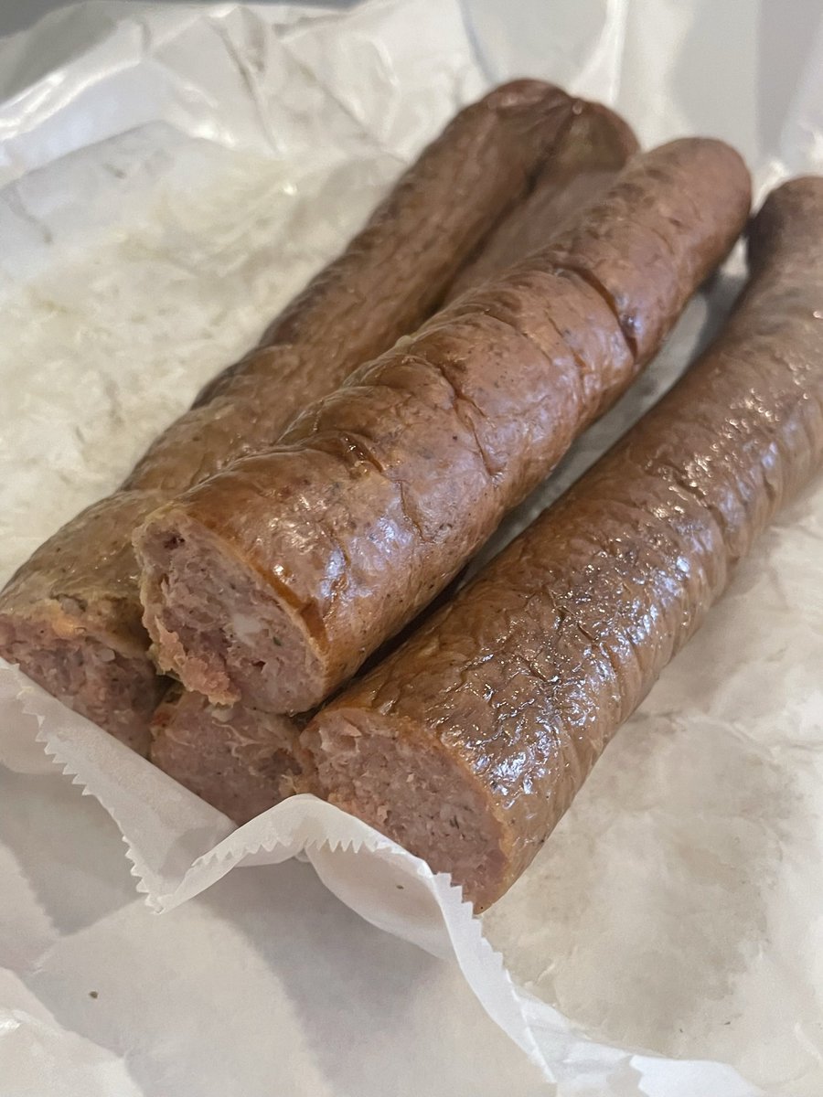 ATometich's tweet photo. It’s hard to take PG pictures of smoked sausage but look what arrived today?!!! My deeply southern mother in law knows the way to my Filipina heart. Pork https://t.co/JxzJTLDadC