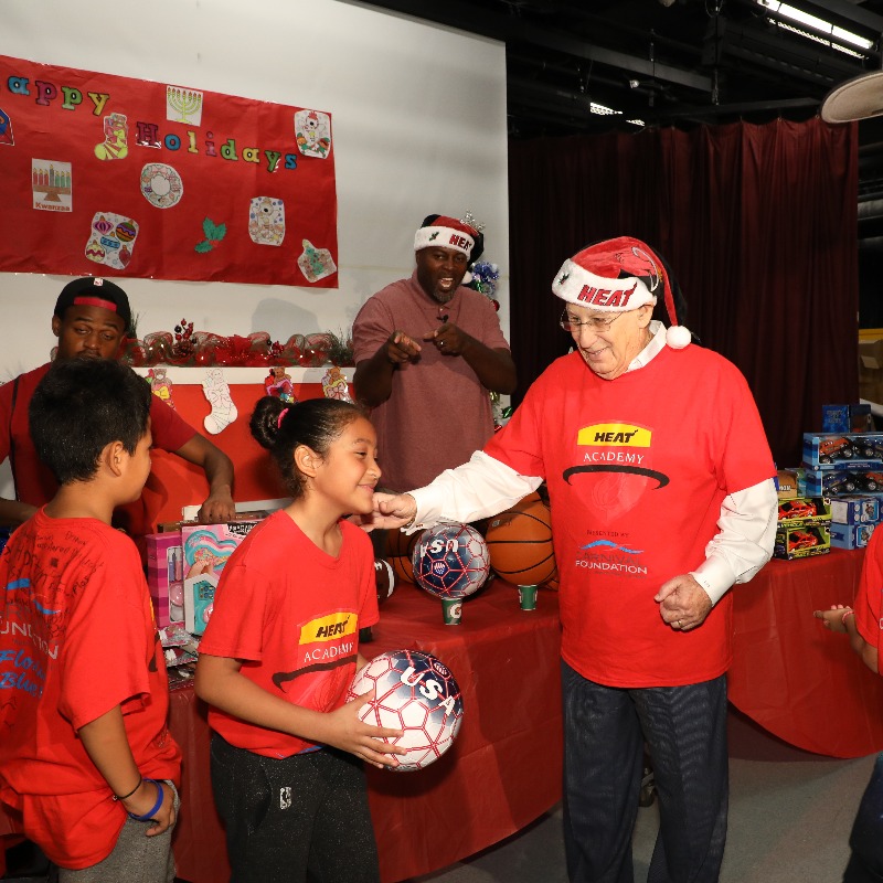 MiamiHEAT's tweet photo. For 15 years Larry Share, a Miami HEAT Season Ticket Member since the beginning, purchased and donated toys to each of our HEAT Academy students every December. Since his passing earlier this year, the Share family has made sure to continue his holiday legacy in South Florida.