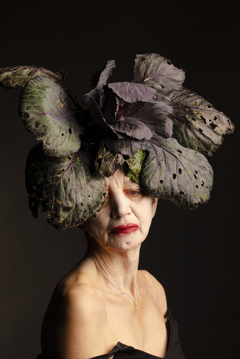 Cost of Living Crisis -Fuel, Food &amp; Fashion. #potrait #cabbage #creativeportrait #nikon #moodylight #foodphotography #wherewomancreate #biodiversity #nature #model #deepsight #sad #sadness #solitude #reflection #midjourney #intenseexpression