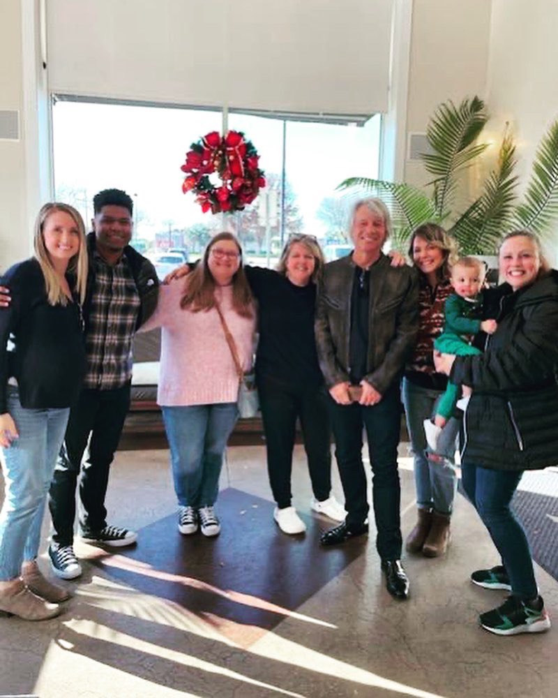 BartholomewRLA's tweet photo. When you go to your department holiday lunch and run into BON JOVI! He was so kind and gracious and thanked us for our work as teachers. Apropos considering we really are half way there and also living on a prayer at this point in the semester.  @WestwoodJH_RISD #risdbelieves https://t.co/mQoGzPGIia