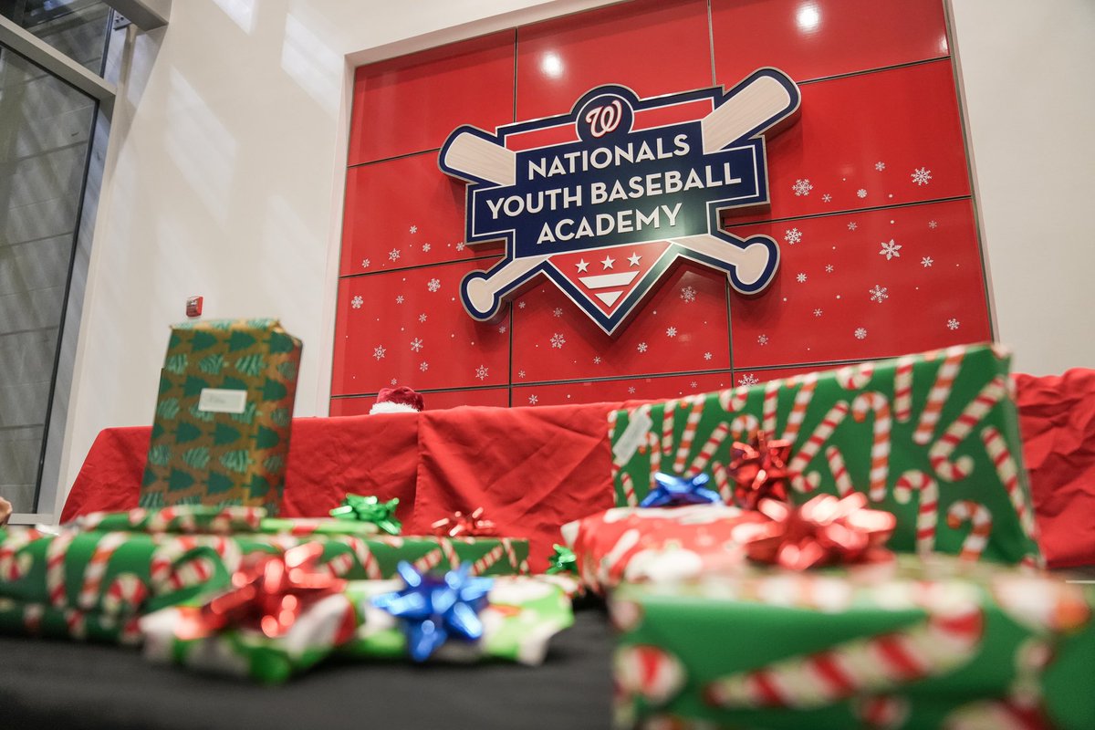 Nats4Good's tweet photo. Yesterday, #NatsAcademy Scholar Athletes were joined by Ryan Zimmerman and @ScreechTheEagle at our annual holiday gift drive.

Since 2014, the local office of @Mintz_Law has supported this tradition. Over 100 kids received gifts this year. 

🔗https://t.co/utidWUMx1Q | #Nats4Good https://t.co/kwOhi94LSA