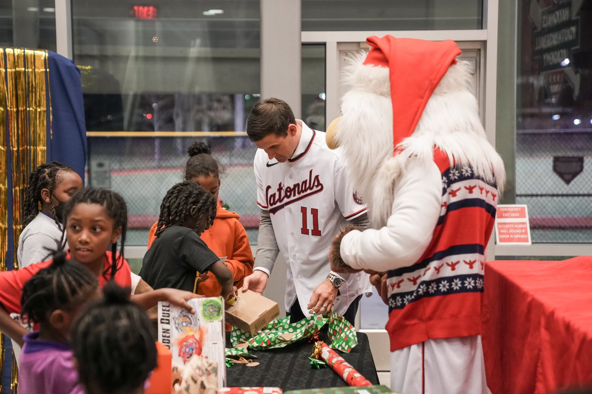Nats4Good's tweet photo. Yesterday, #NatsAcademy Scholar Athletes were joined by Ryan Zimmerman and @ScreechTheEagle at our annual holiday gift drive.

Since 2014, the local office of @Mintz_Law has supported this tradition. Over 100 kids received gifts this year. 

🔗https://t.co/utidWUMx1Q | #Nats4Good https://t.co/kwOhi94LSA